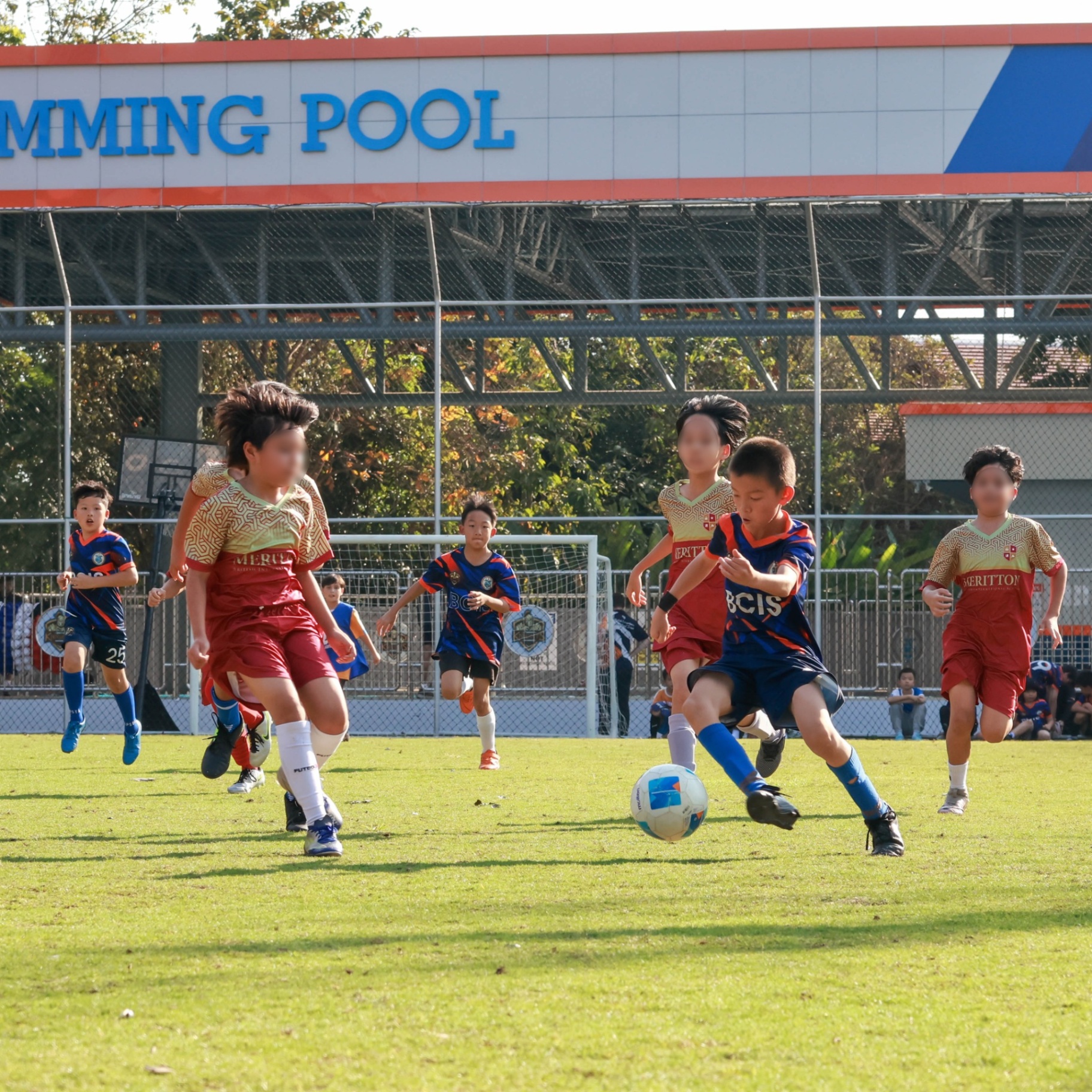 BCIS Falcons football match in action